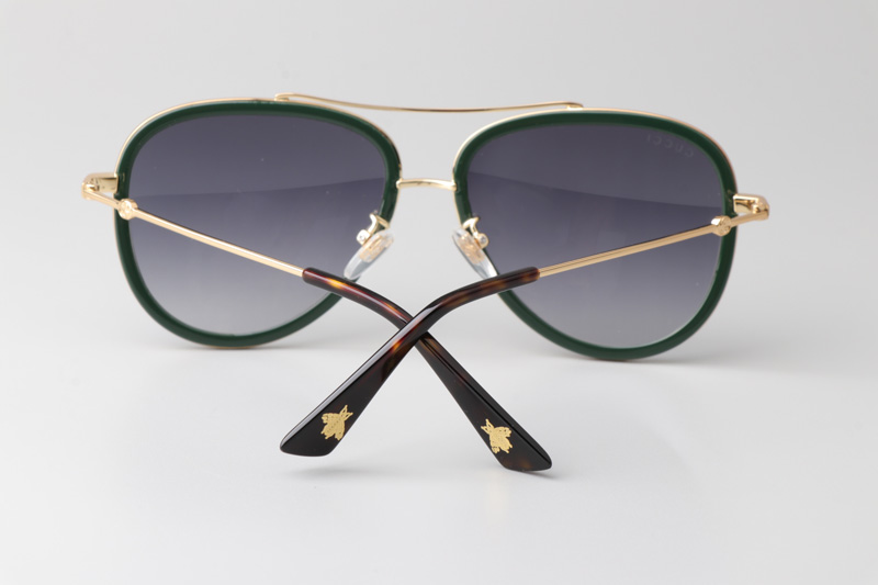 GG0062S Sunglasses Green Gold Gradient Gray
