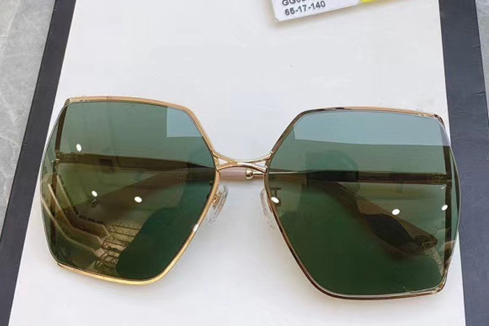 GG0817S Sunglasses In Gold Pink Blue Lens