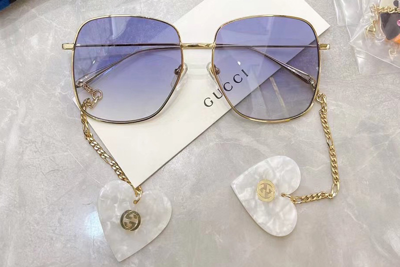 GG1031S Sunglasses In Gold Blue