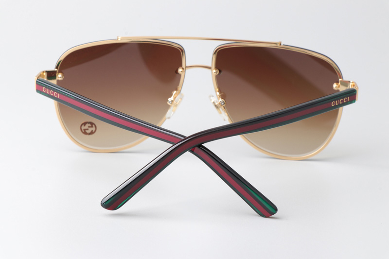 GG1418S Sunglasses Gold Green Gradient Brown