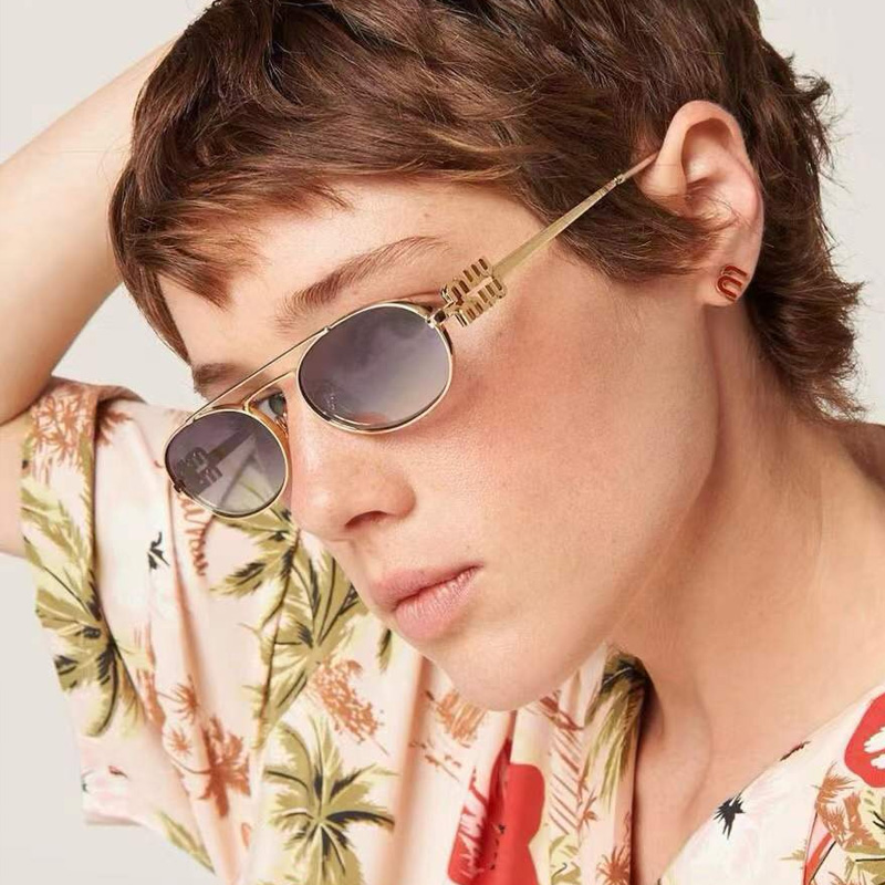 MU54ZS Sunglasses Gold Gradient Gray